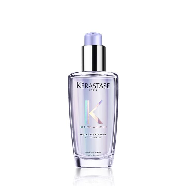 Kérastase hair care product bottle on a white background